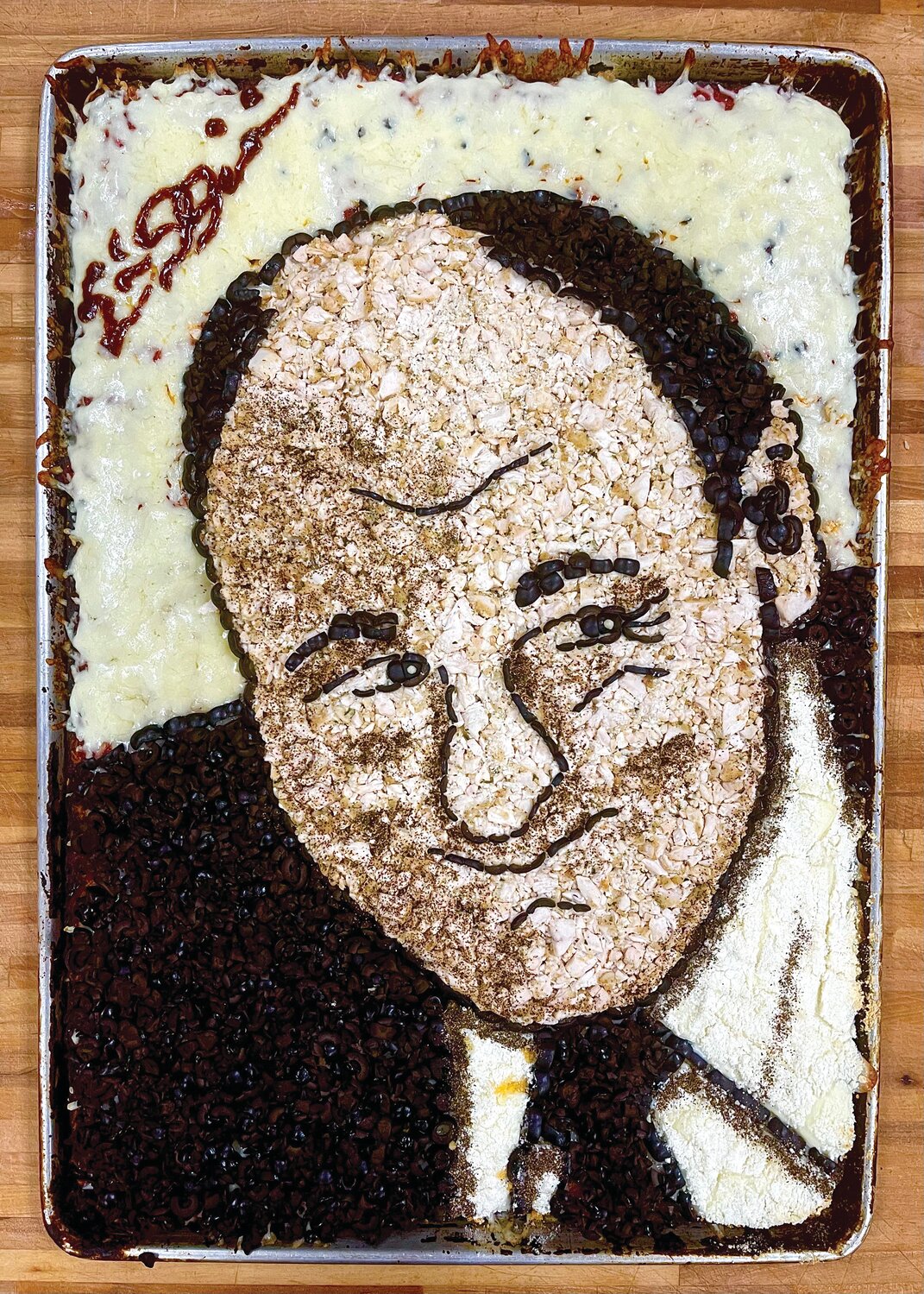 PIZZA ART: Eric Palmieri crafts portraits with pizza. He’s tackled an array of subjects from TV mobster Tony Soprano to pizza reviewer and Barstool Sports magnate Dave Portnoy.